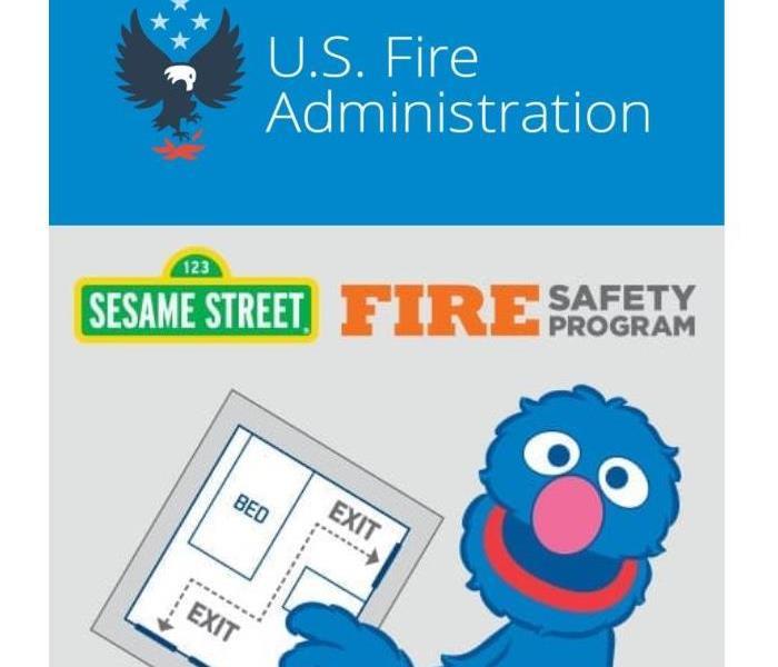 USFA logo and Grover of Sesame Street holding a fire exit plan