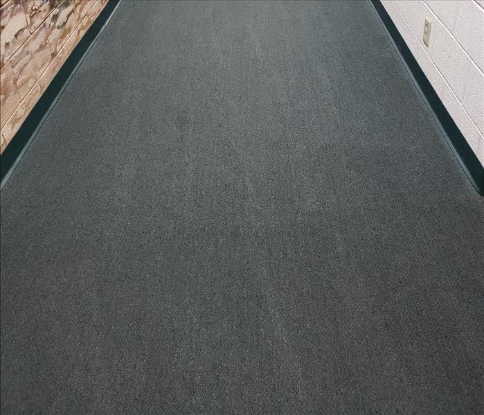 A view of a commercial grade grey carpet